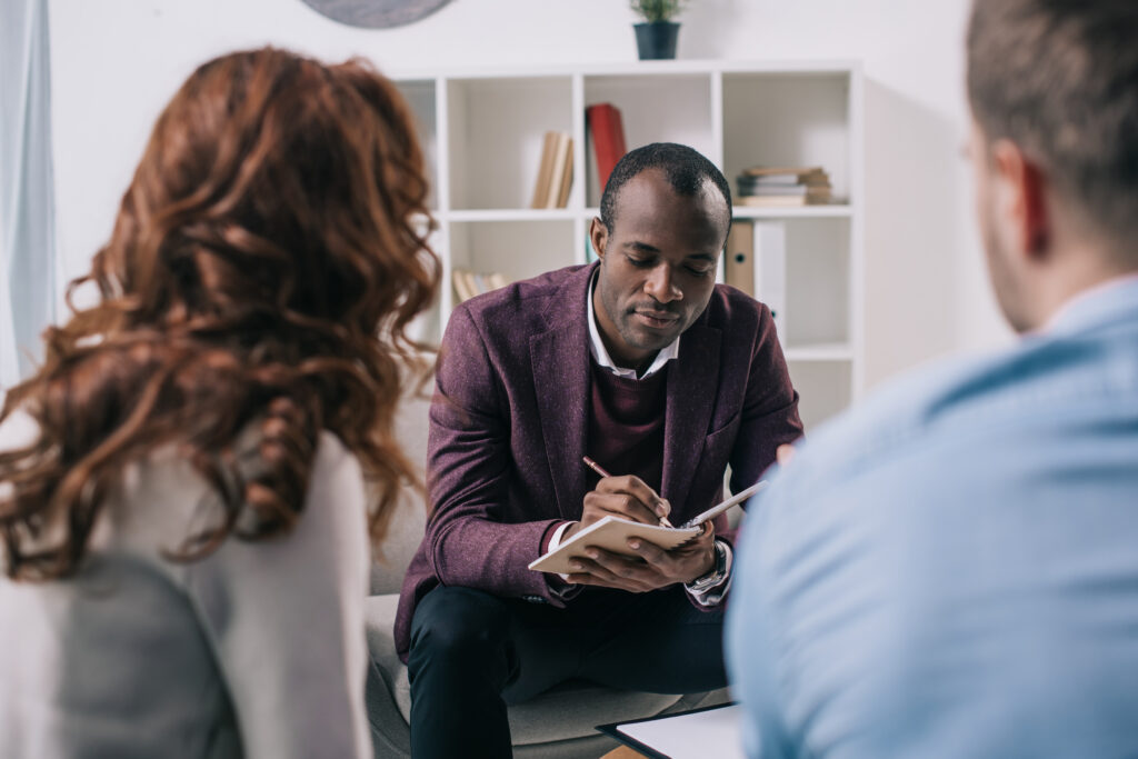 A christian counseling counselor providing care to a couple.  Cognitive Behavioral therapy.